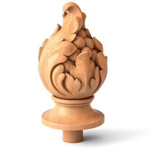 May include: A detailed wooden finial with a carved floral design. The finial features a bulbous base with a decorative, layered top, and a cylindrical stem. The wood has a natural, light brown color.