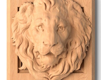 May include: A carved wooden lion's head, centered within a square frame. The lion's face is detailed with fur and facial features. The wood has a natural, light brown color.