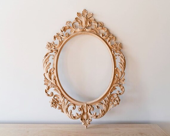 fancy oval mirror