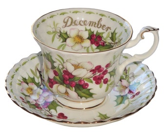 Royal Albert England December Flowers of the Month Tea Cup & Saucer + May, June and October Orphan Saucers + May Orphan Cup w/ Small Chip