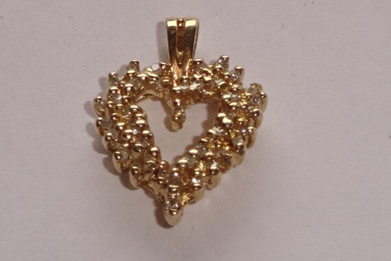 10K Gold and Diamond Pendant W/ COA 