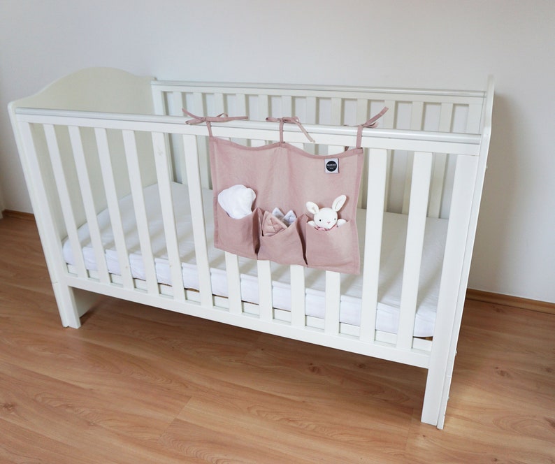 Crib organizer kids Hanging diaper caddy Baby girl Etsy