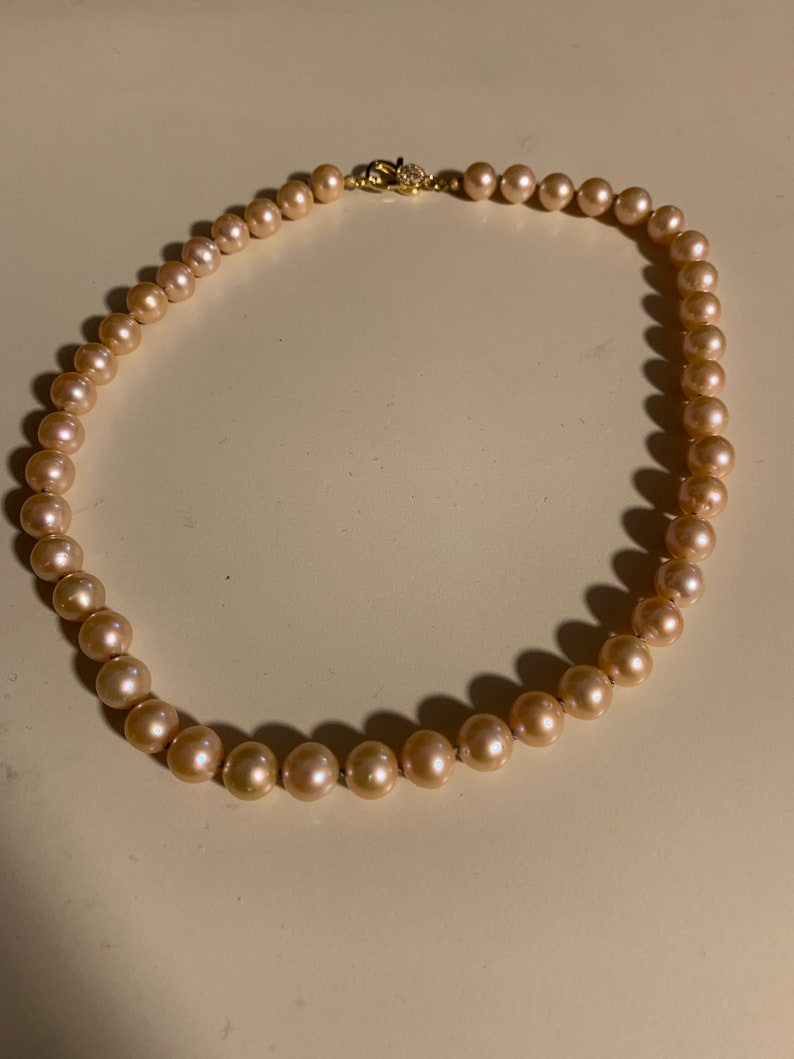 One strand of round peach pearl choker necklace Gold filled CZ ring clasp Hand Knotted on double silk thread 14600