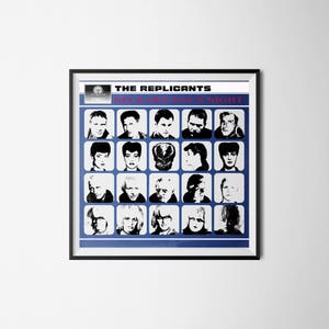 May include: A framed poster featuring a blue background with a grid of black and white portraits. The text "THE REPLICANTS" and "DECKARD DAY'S NIGHT" are displayed in red and blue. The poster is in a black frame.