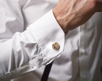 Brown trout cufflinks for a special occasion.  Caught by a flyfisherman form a local river, recycled leather.