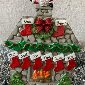Personalised Family of 8 Stockings over Log Cabin Fire with Santa Christmas Table Topper Decoration Free Standing