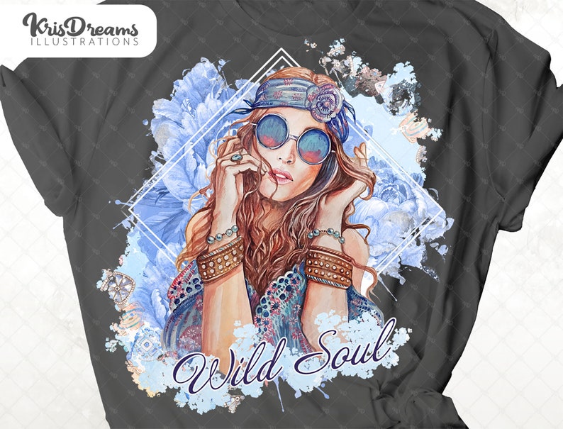 May include: A gray t-shirt with a watercolor design of a woman with long brown hair wearing a headband and sunglasses. The design includes blue flowers and the text "Wild Soul".