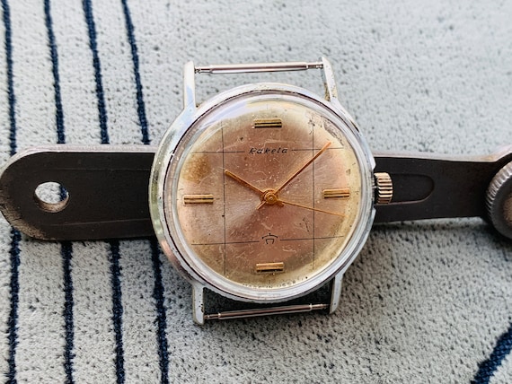 Raketa 16 jewels watch discount