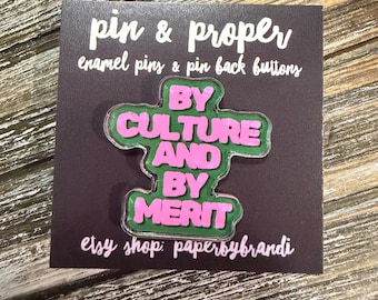 By Culture And By Merit Acrylic Lapel Pin