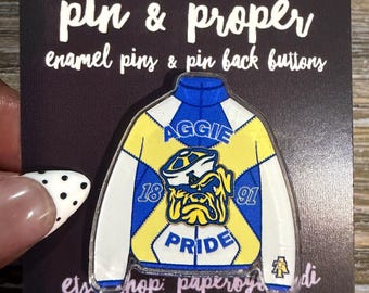Aggie Pride Track Jacket Acrylic Lapel Pin