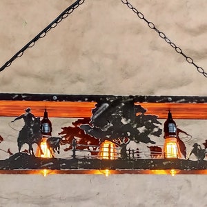 Western ceiling lights. Rustic light fixture. Cowboys and cattle