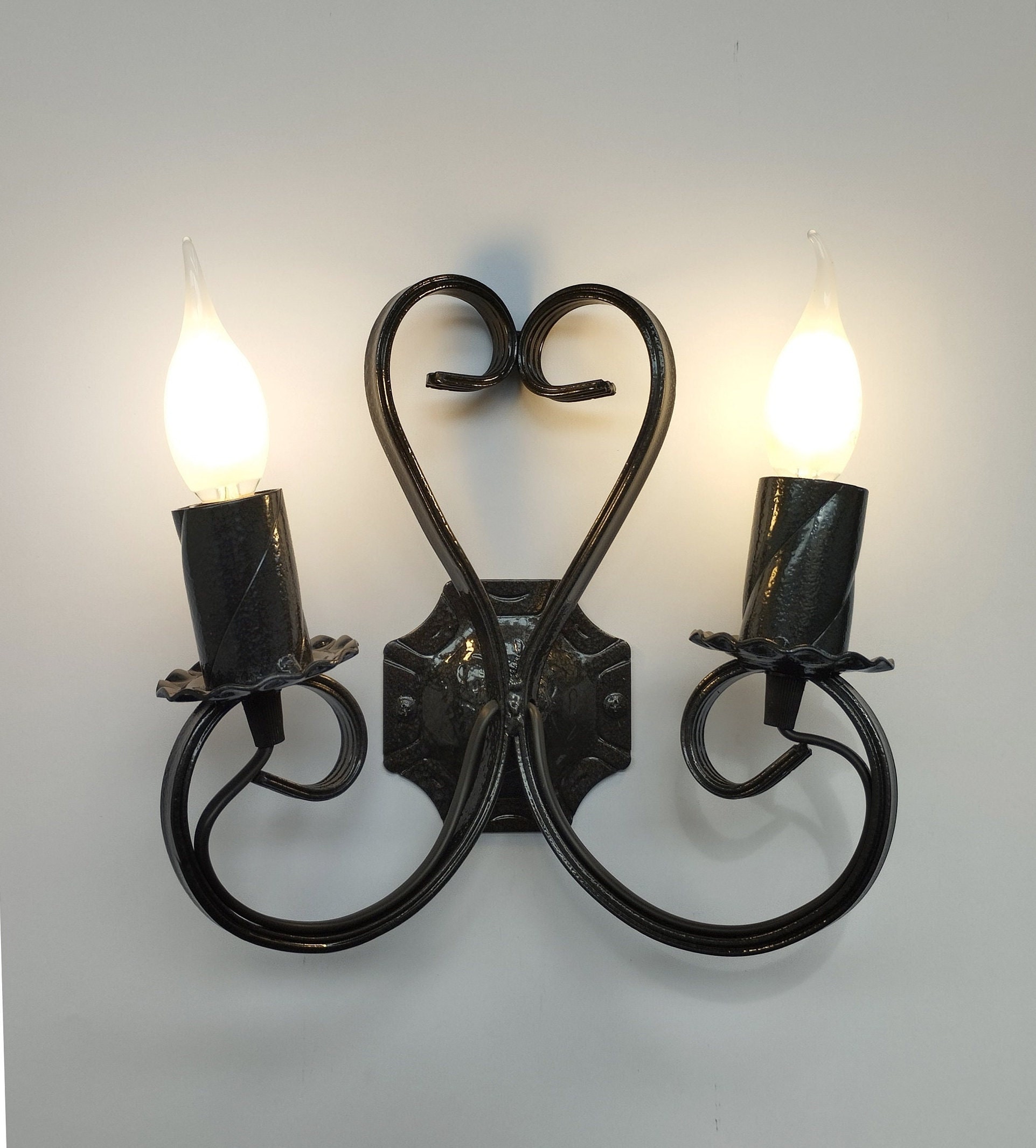 Wrought iron wall light - Double scon...