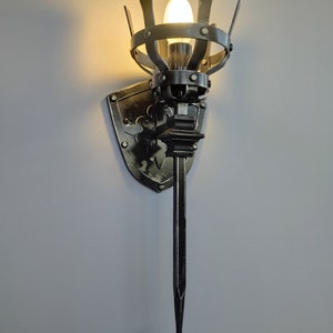 Castle torch sconce. Iron medieval style wall light