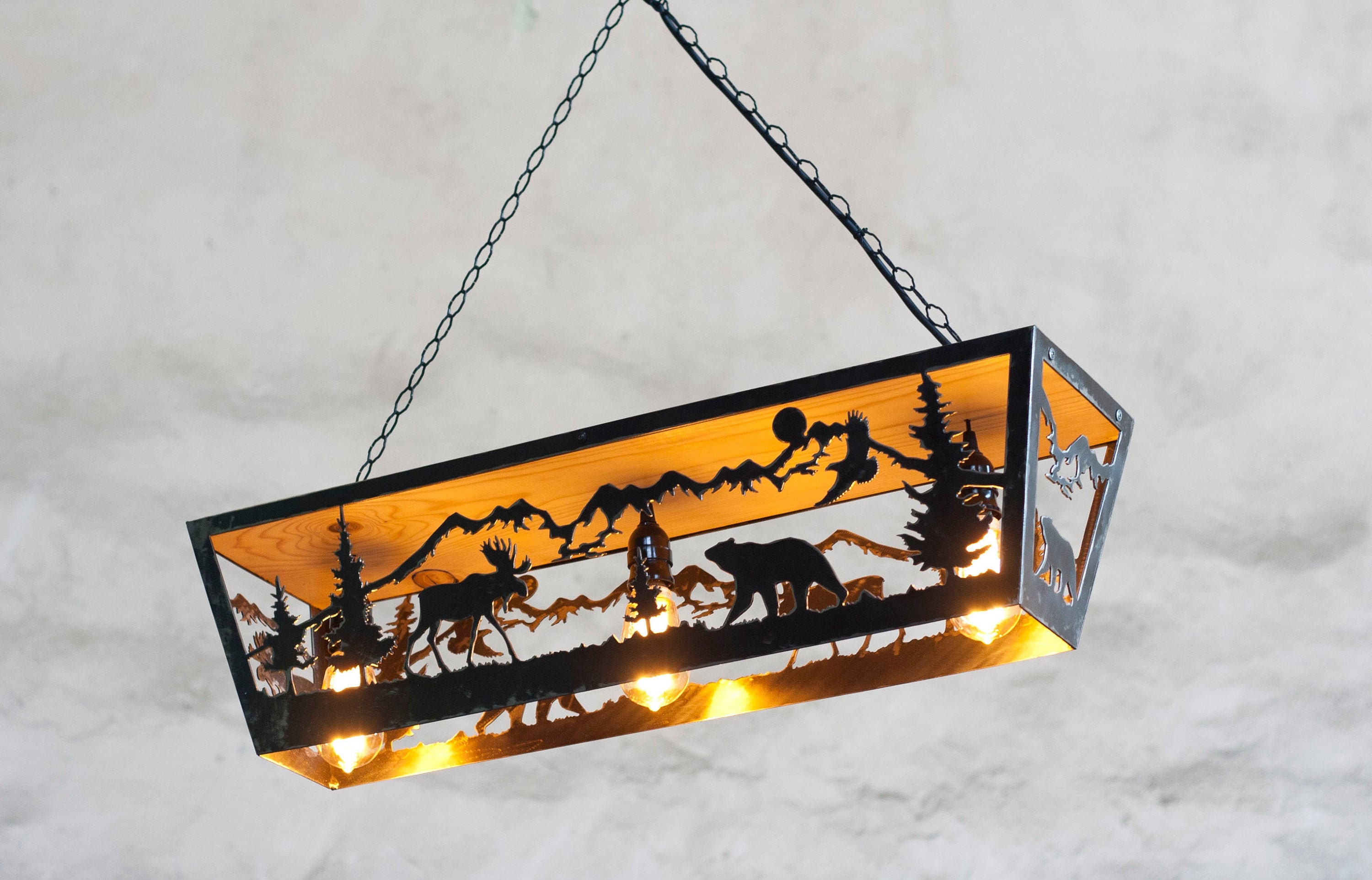 Rustic Three Lights Fixture. Moose and Bear Pendant Light. Three