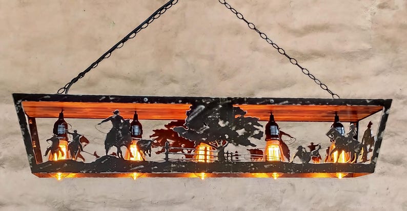 Rustic light fixture. Western cowboys themed. Five lights.