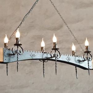 Castle style wood and wrought iron chandelier lights