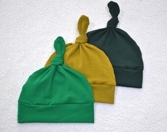 green baby hat