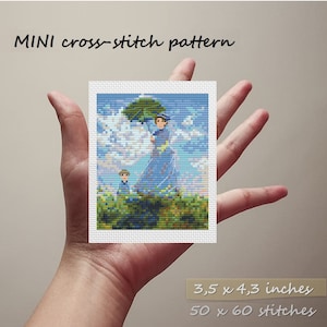 Könnte beinhalten: Kreuzstichmuster einer Frau und eines Kindes, die mit einem blauen Regenschirm über einem Feld gehen. Das Muster ist 3,5 x 4,3 Zoll groß und hat 50 x 60 Stiche.