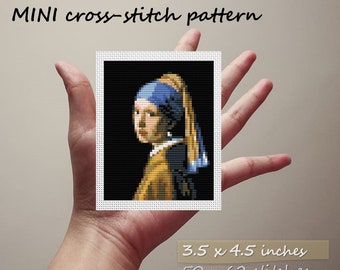 May include: A cross-stitch pattern of the famous Girl with a Pearl Earring painting. The pattern is 3.5 x 4.5 inches and has 50 x 62 stitches.