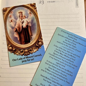 May include: Two prayer cards featuring religious imagery and text. One card displays an oval portrait of the Virgin Mary and child, with the text "Our Lady of Mount Carmel, pray for us!". The other card has a prayer.