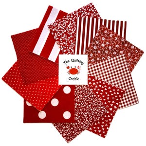May include: A collection of red fabric squares with various white patterns, including stripes, polka dots, floral, and gingham. The squares are arranged in a circular pattern, with a logo in the center that reads "The Quilting Crabb".