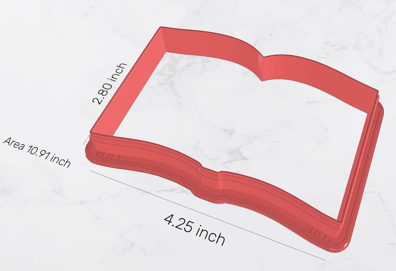 May include: Red plastic cookie cutter shaped like an open book. The cutter is 4.25 inches wide and 2.80 inches tall. The area of the cutter is 10.91 square inches.
