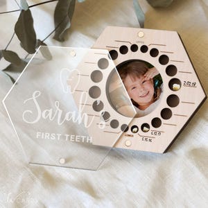 Personalized baby teeth keepsake box for first haircut and tooth fairy memories.