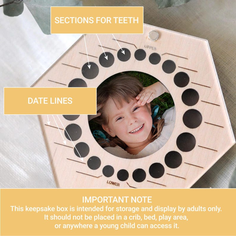 May include: A hexagonal light-coloured wooden keepsake box featuring a circular centre cutout for a photograph. The frame includes twenty small circular holes labelled UPPER and LOWER for teeth storage, with etched date lines next to each hole.