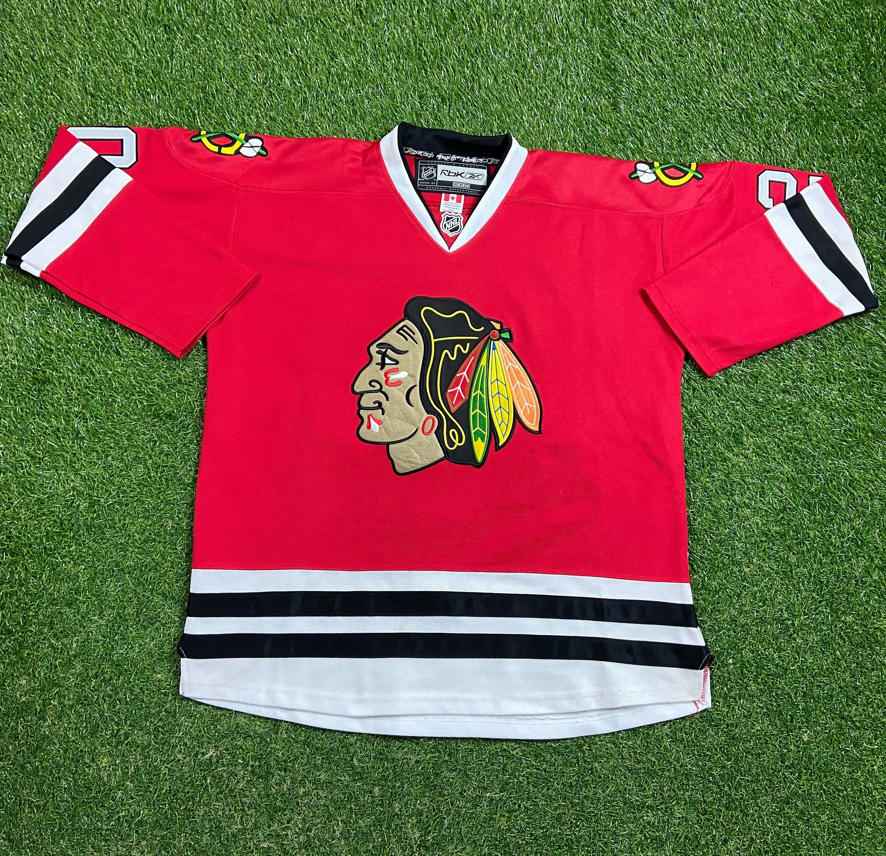Blackhawks jersey with fight strap sale