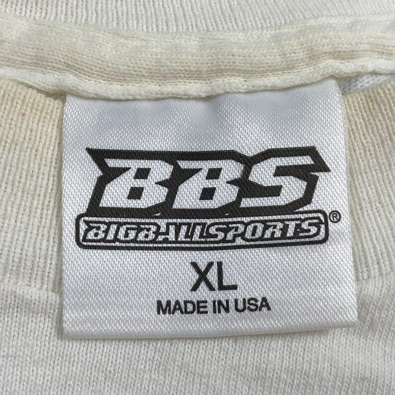 May include: White tag with black text that reads "BBS Big Ball Sports" and "XL Made in USA".