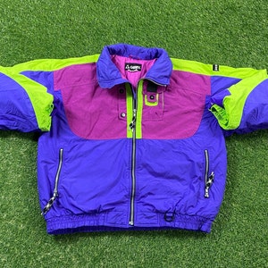 May include: A purple, pink, and green ski jacket with a zipper closure and a logo that says "Gerry".