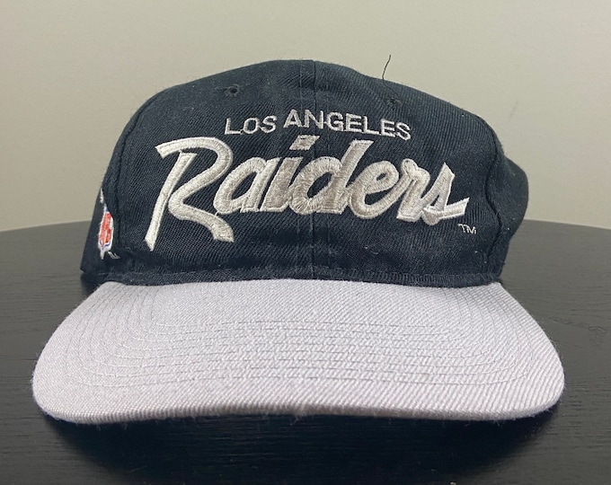 Vintage Los Angeles Raiders Snapback Hat Cap Sport Specialties Silver and Black 1990s Throwback California Oakland Las Vegas Classic Script