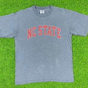 Vintage NC State University WolfPack T Shirt NCAA College Basketball The Cotton Exchange Made USA Medium North Carolina M