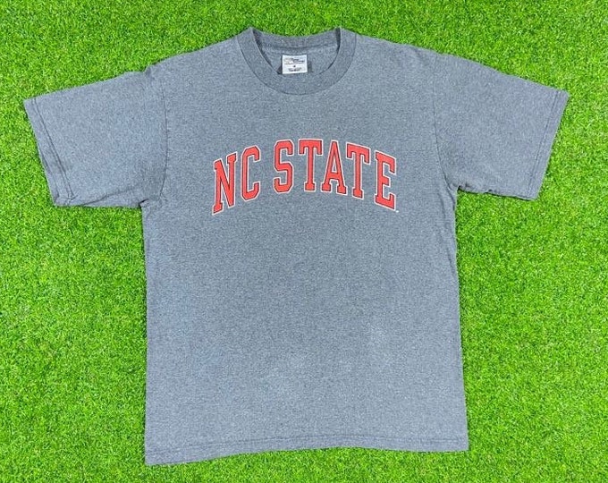 Vintage NC State University WolfPack T Shirt NCAA College Basketball The Cotton Exchange Made USA Medium North Carolina M