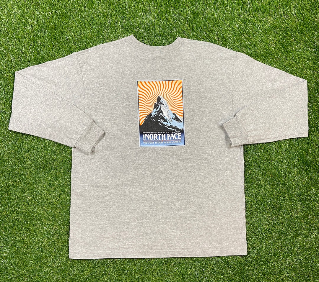 THE NORTH FACE☆NEVER STOP EXPLORING L/S R/TEE_NT7TN60 Vintage The north Face graphic t shirt A5 Series XL orange