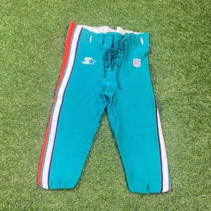 Pantalones de fútbol americano vintage de los Miami Dolphins, fabricados en EE. UU., talla 32, uniforme de la NFL de Florida, años 2000, usados en el juego.