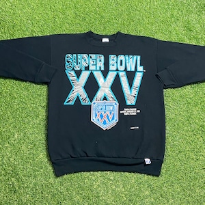 May include: Black sweatshirt featuring "SUPER BOWL XXV" in teal and silver lettering. The design includes the Super Bowl XXV logo and event details. Made of a soft material, this vintage sweatshirt is perfect for sports fans.
