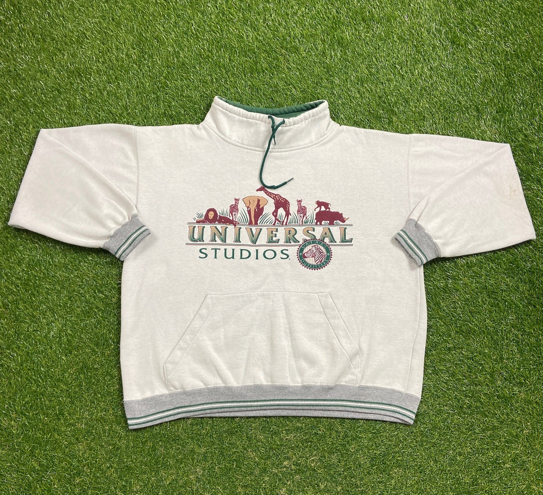 トップス 80's UNIVERSAL STUDIOS Florida SWEAT Vintage 1980s Universal Studios Florida Raglan Crewneck