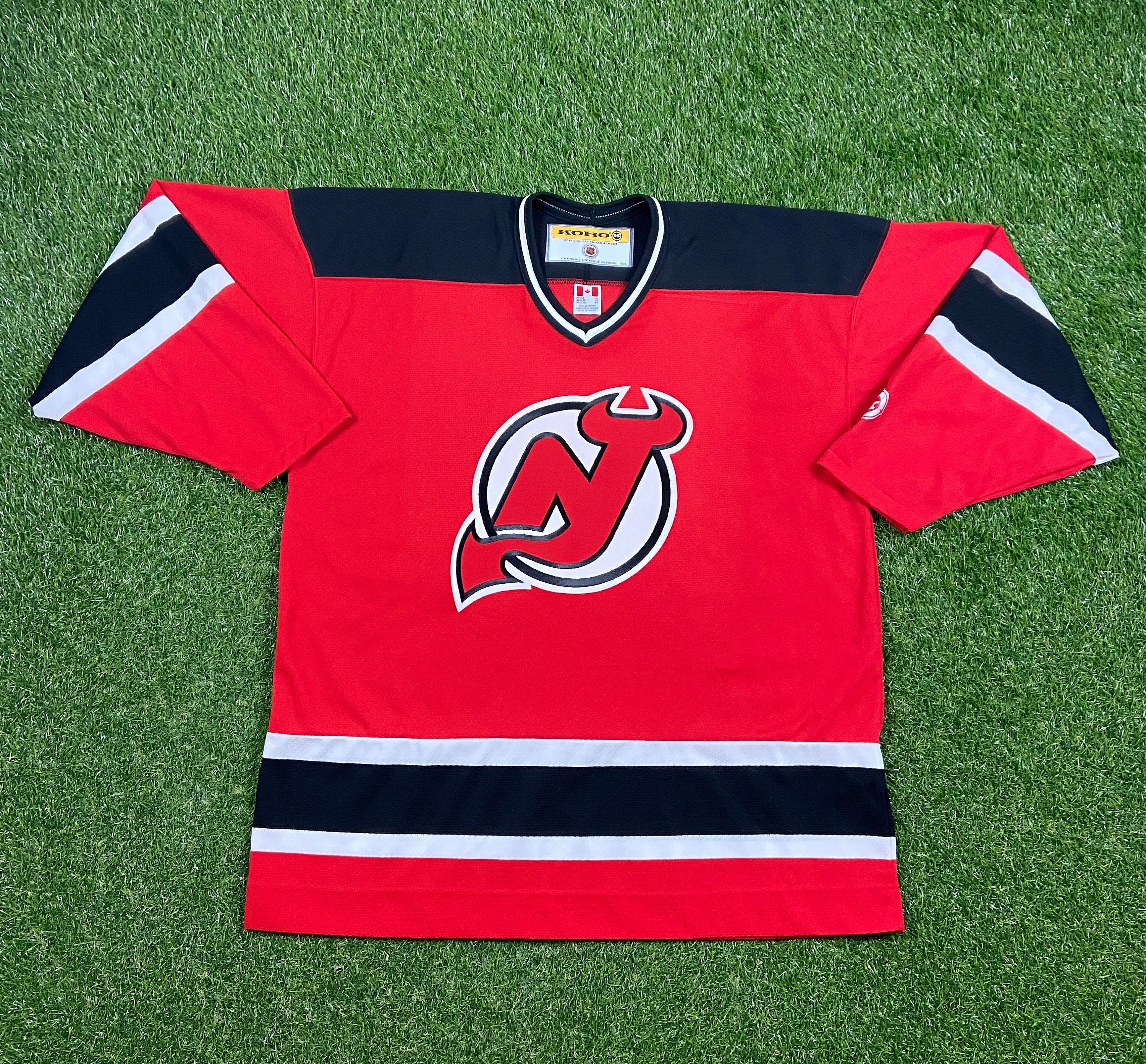 Reebok/CCM Boy’s Sz L/XL NHL New Jersey Devils Jersey ~White/Red/Black~
