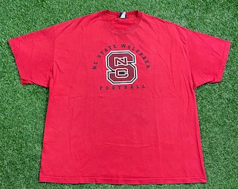 Vintage NC State University WolfPack T-shirt Champs Tillverkad USA Storlek 2XL NCAA College Basketball North Carolina 1990-talet 90-talet