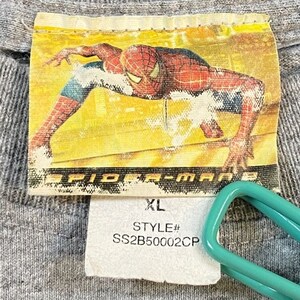 May include: A grey t-shirt with a Spider-Man 3 graphic on the front. The tag says "XL" and "STYLE# SS2B50002CP".