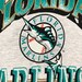 T-shirt Vintage Florida Marlins 1992 - Style Disco Wham Vice - Taille M/L - Coton Gris/turquoise - Occasion Très Bon état