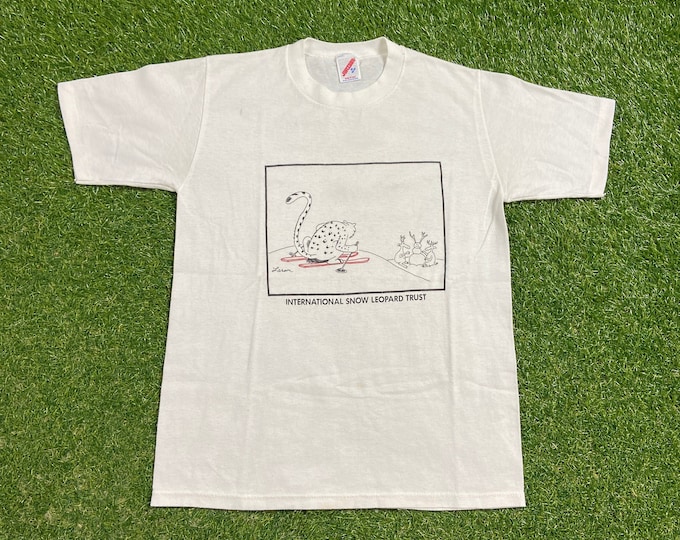 Vintage International Snow Leopard Trust T Shirt Tee Made USA Size Medium M Ski Mountain Resort Snowboard Funny Cartoon 1990s 90s