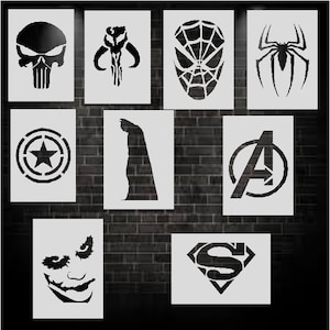 May include: Set of 10 black and white stencils featuring popular superhero and villain characters, including The Punisher, Boba Fett, Spiderman, Batman, The Joker, Superman, Captain America, and more.