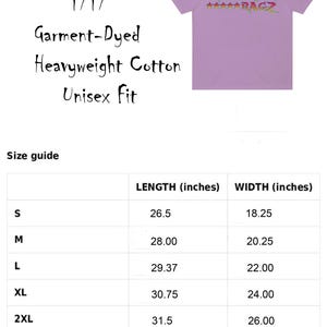 May include: A lilac-colored t-shirt with the text "ROCKIN' RAGZ" in a colorful, stylized font. The shirt is garment-dyed, made of heavyweight cotton, and has a unisex fit. Size guide shows lengths from 26.5 to 33.5 inches and widths from 18.25 to 29 inches.