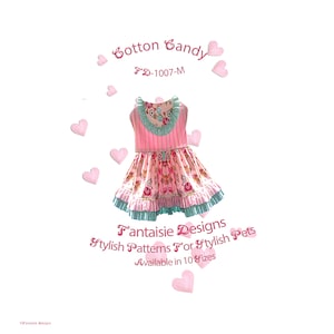 May include: A pink and blue dress with a floral print and ruffles. The dress is labeled "Cotton Candy FD-1007-M" and is part of the "Fantaisie Designs Stylish Patterns For Stylish Pets" collection. The dress is available in 10 sizes.