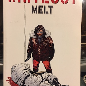 May include: Comic book cover for "Whiteout: Melt" by Greg Rucka and Steve Lieber. The cover features a person in a red parka and red pants standing over a person in a white jumpsuit. The title is in red block letters.
