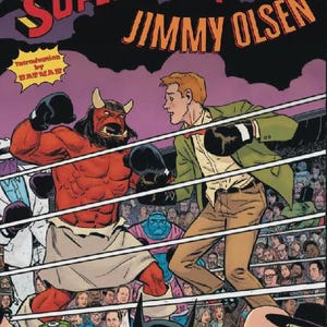 May include: Comic book cover for "Superman's Pal Jimmy Olsen" featuring a boxing match between a red-skinned demon and Jimmy Olsen. The cover includes the DC Comics logo, character names, and the text "Who Killed Jimmy Olsen? Deluxe Edition."