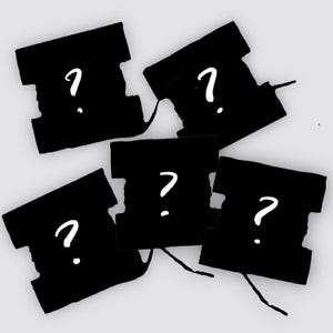 May include: Five black puzzle pieces with a white question mark on each. The pieces are scattered on a light gray background. The puzzle pieces have a unique shape with notches and curves.