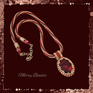 Black and Red Paua Shell Cabochon Pendant on Red and Gold Beaded Spiral Necklace